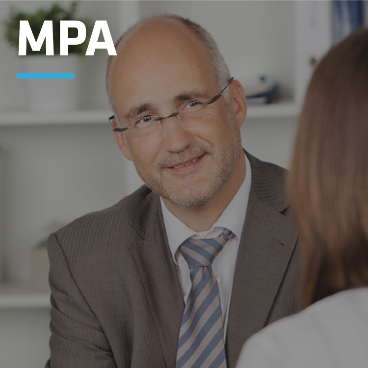 A professional HR consultant in a suit smiling during a discussion with a candidate in an office. The image features the MPA branding.